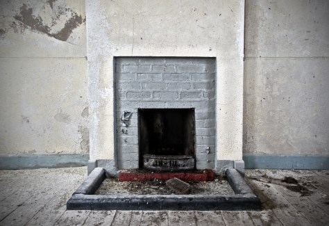 The simple fireplace inside the classroom that kept the schoolmaster and pupils warm in the winter months