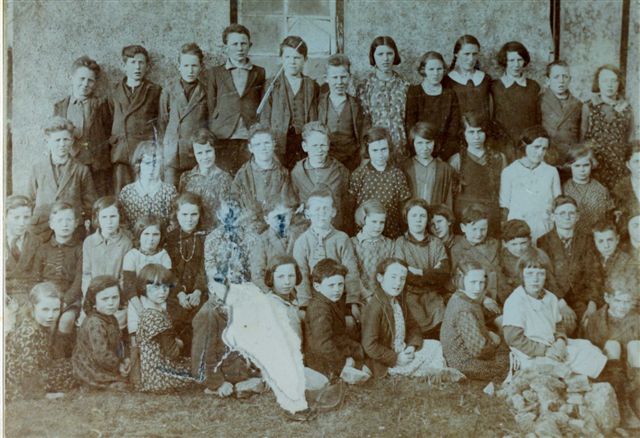 The school children of Kilnaboy National School gathered outsiThe old post office (X-PO) in Kilnaboy in 1932.
